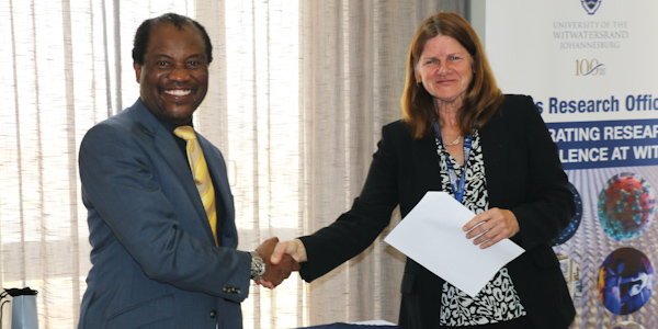 Wits VC Prof Zeblon Vilakazi congratulates Wits DVC Research Prof Lynn Morris on her renewed NRF A1 rating